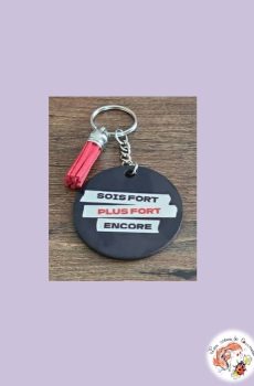 Porte clé Indochine Sois fort plus forte encore