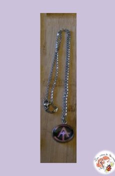 Chaine et son pendentif Indochine Arena tour